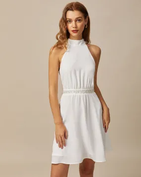 The White Mock Neck Pearls Backless Mini Dress